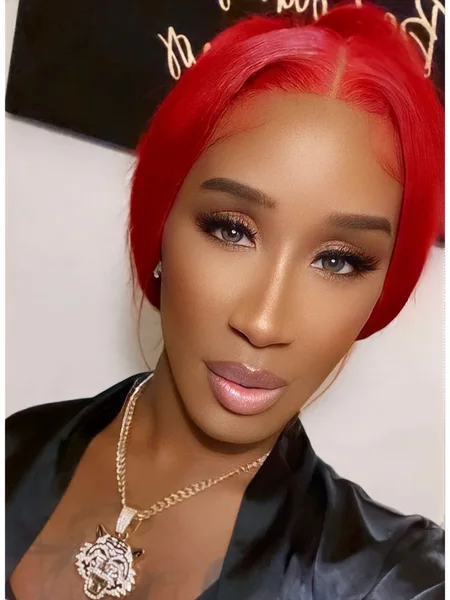 THE RED HEAD BOMBSHELL