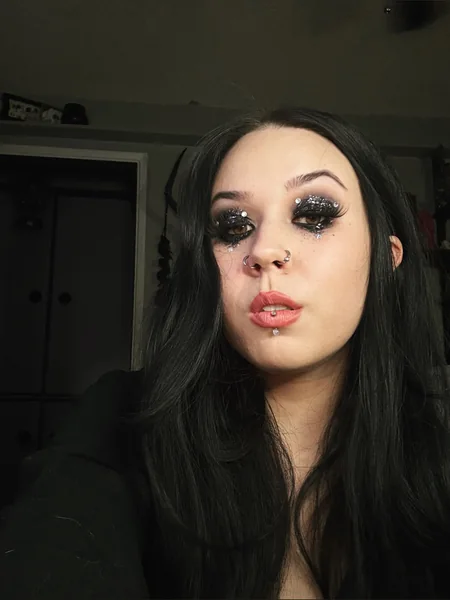 M.